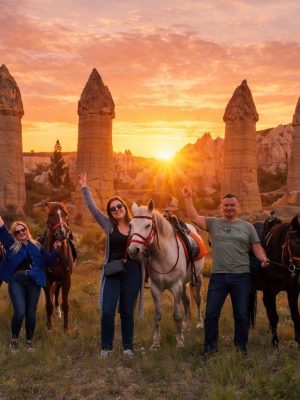 Cappadocia horse riding tour through fairy chimneys and valleys at sunset