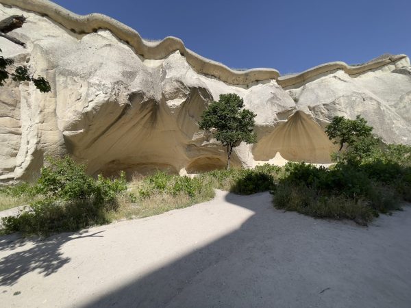 Cappadocia Red + Green Tour – Full Experience in One Tourists visiting both northern and southern highlights of Cappadocia, including valleys, underground cities, and historical sites.